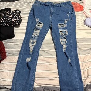 Distressed Blue Denim Jeans